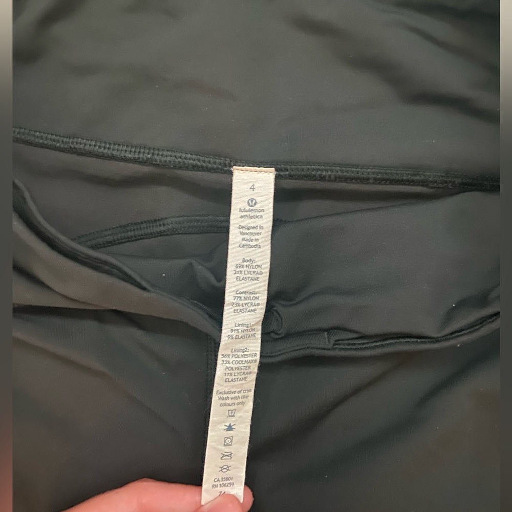 black Lululemon athletica leggings with white dots size 4